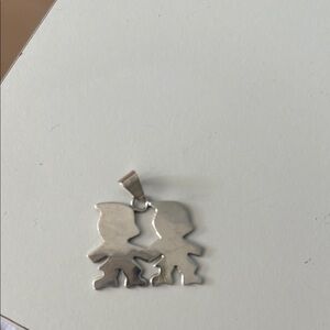 Beautiful sterling silver boy charm.